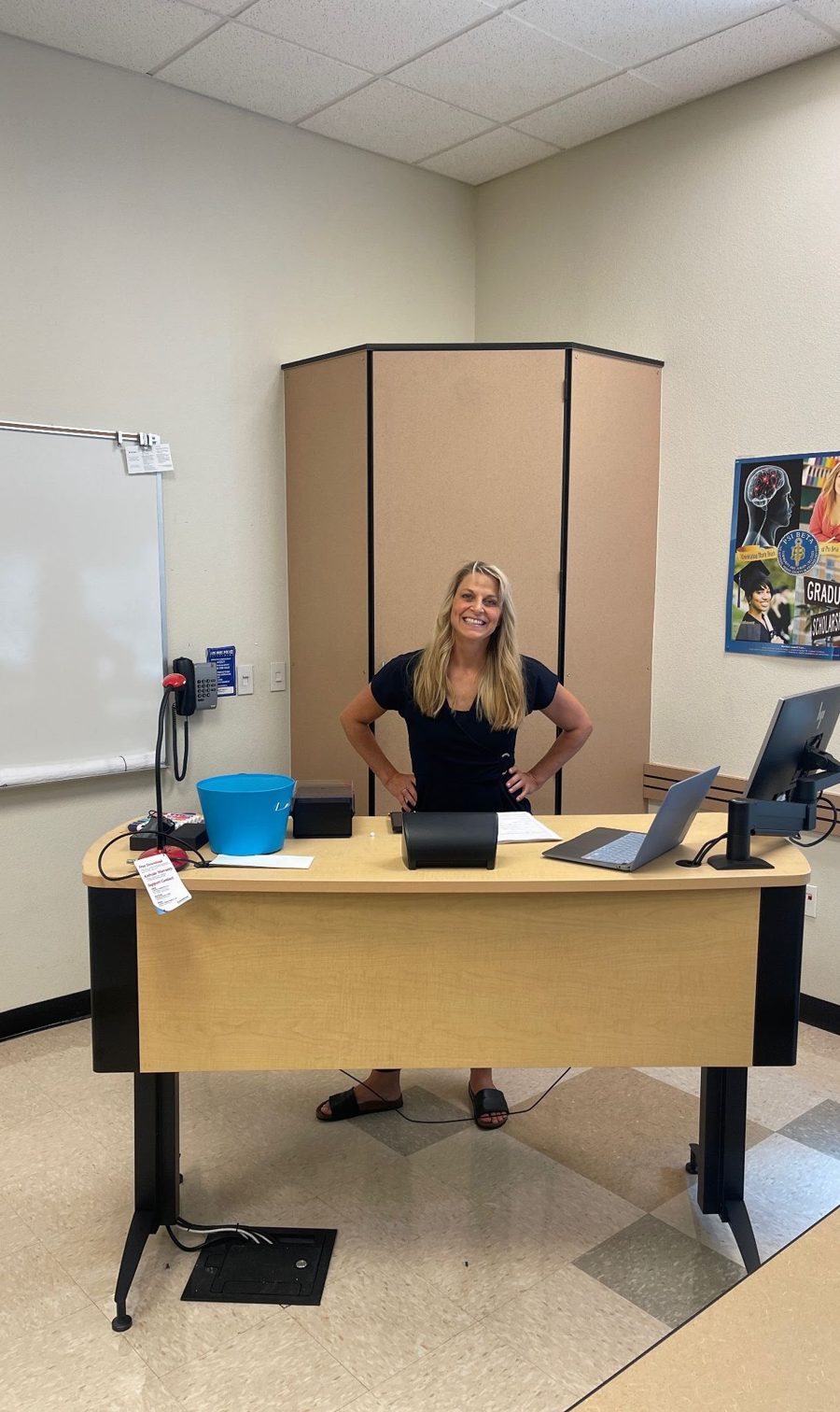Professor Neitling at her desk in her Folsom Lake College classroom
